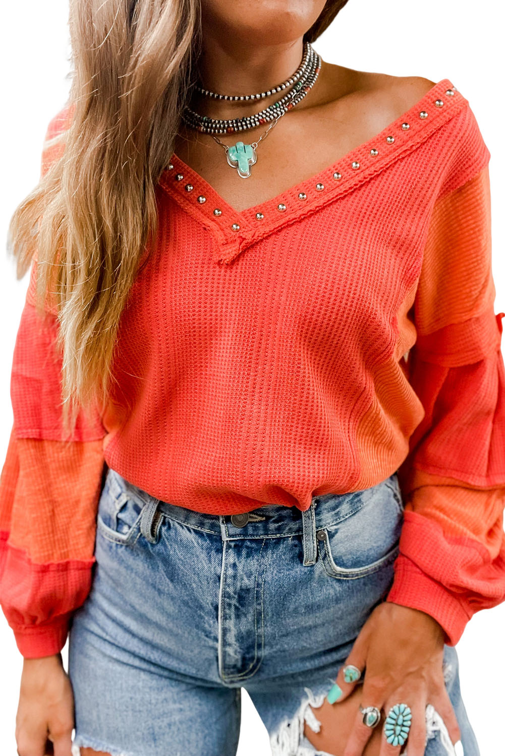 Fiery Red Studded V Neckline Exposed Seam Textured Knit Top