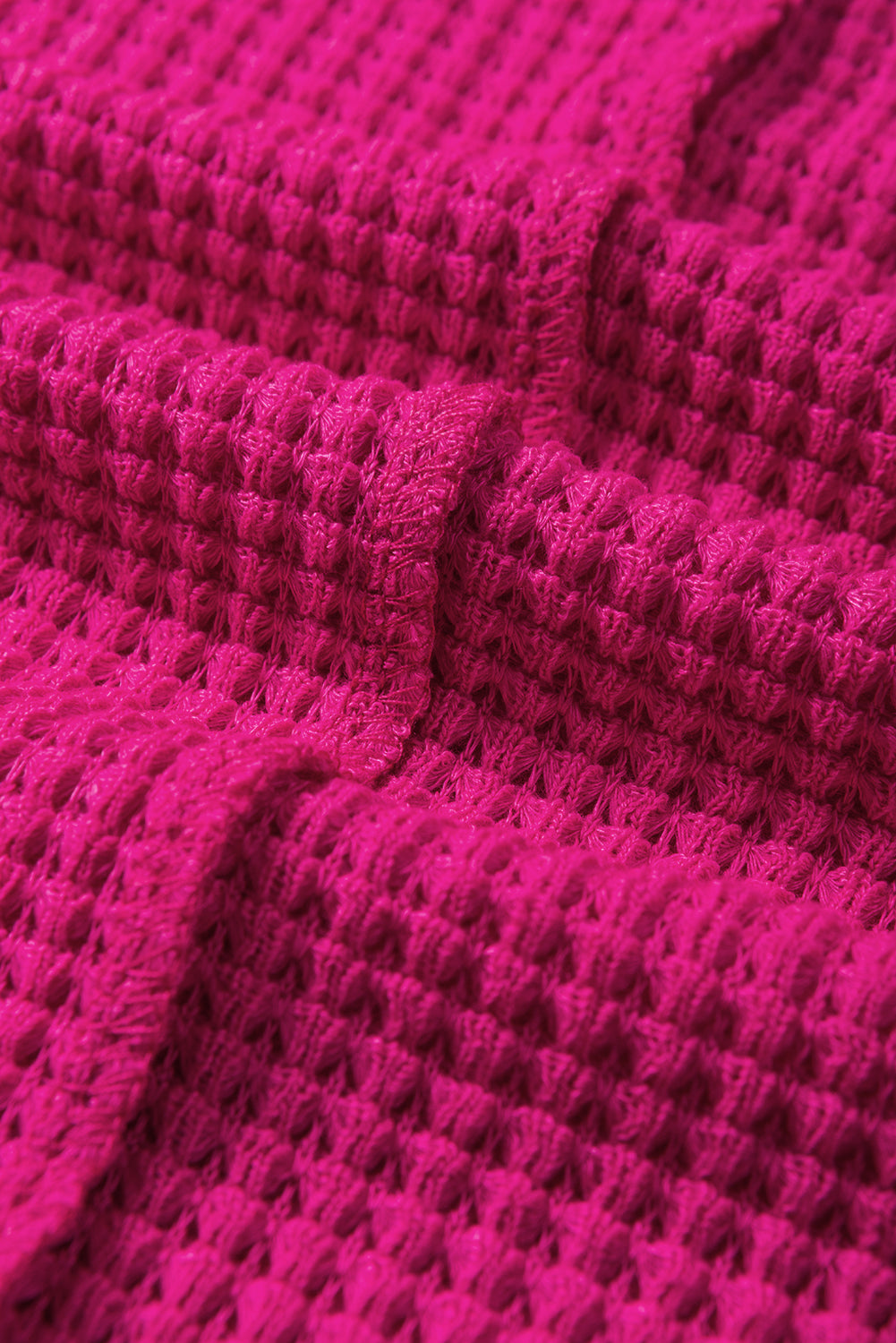 Rožnato rdeča teksturirana majica z dolgimi rokavi na sredinskem šivu