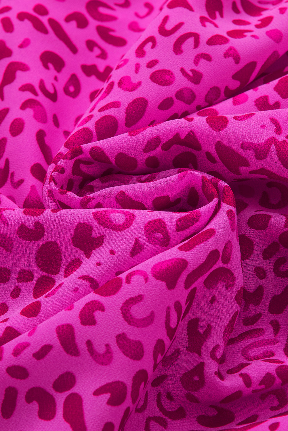 Bluza z napihnjenimi rokavi z rožnatim leopardjem in striženjem