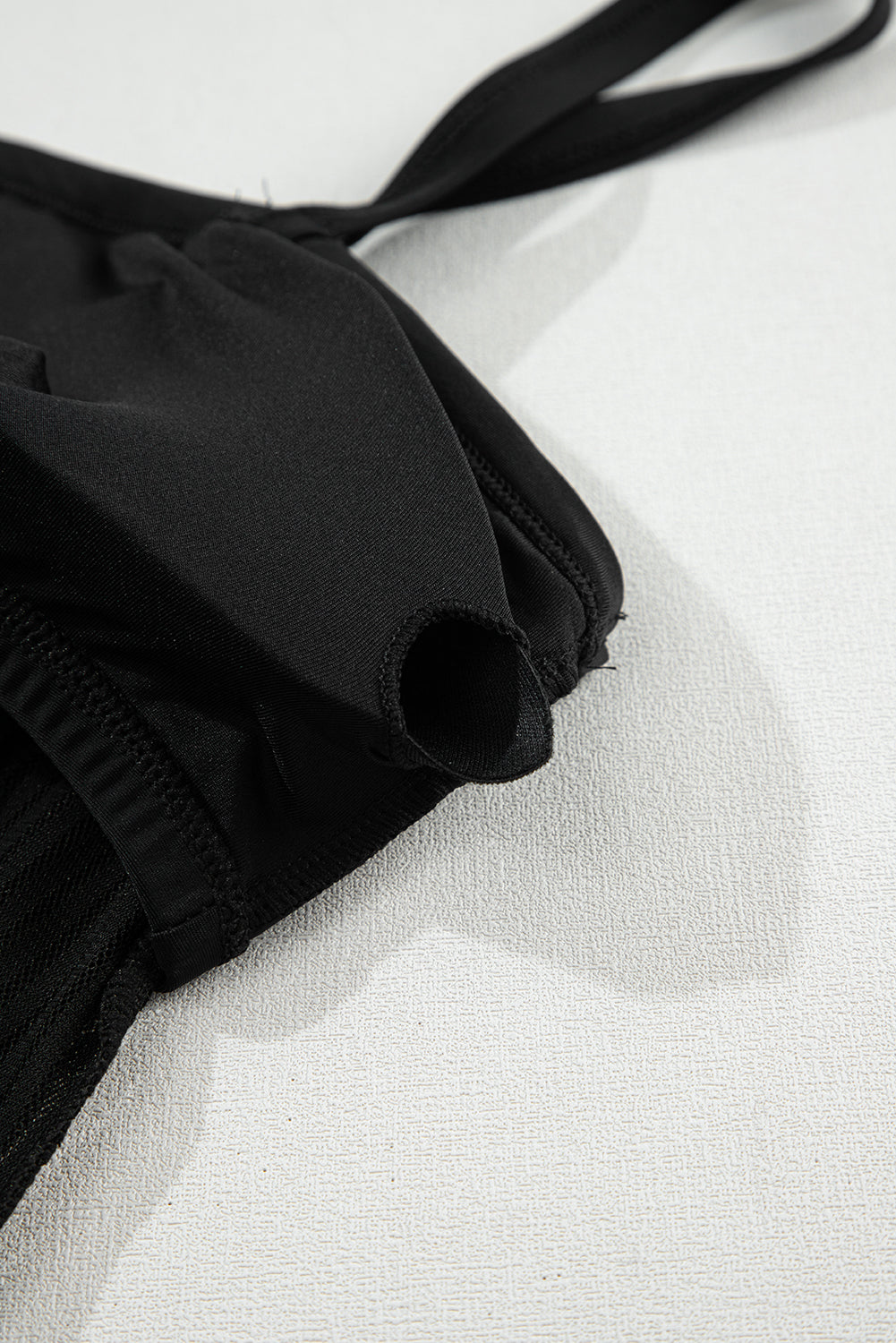 Costume da bagno tankini con orlo annodato in rete a righe nere