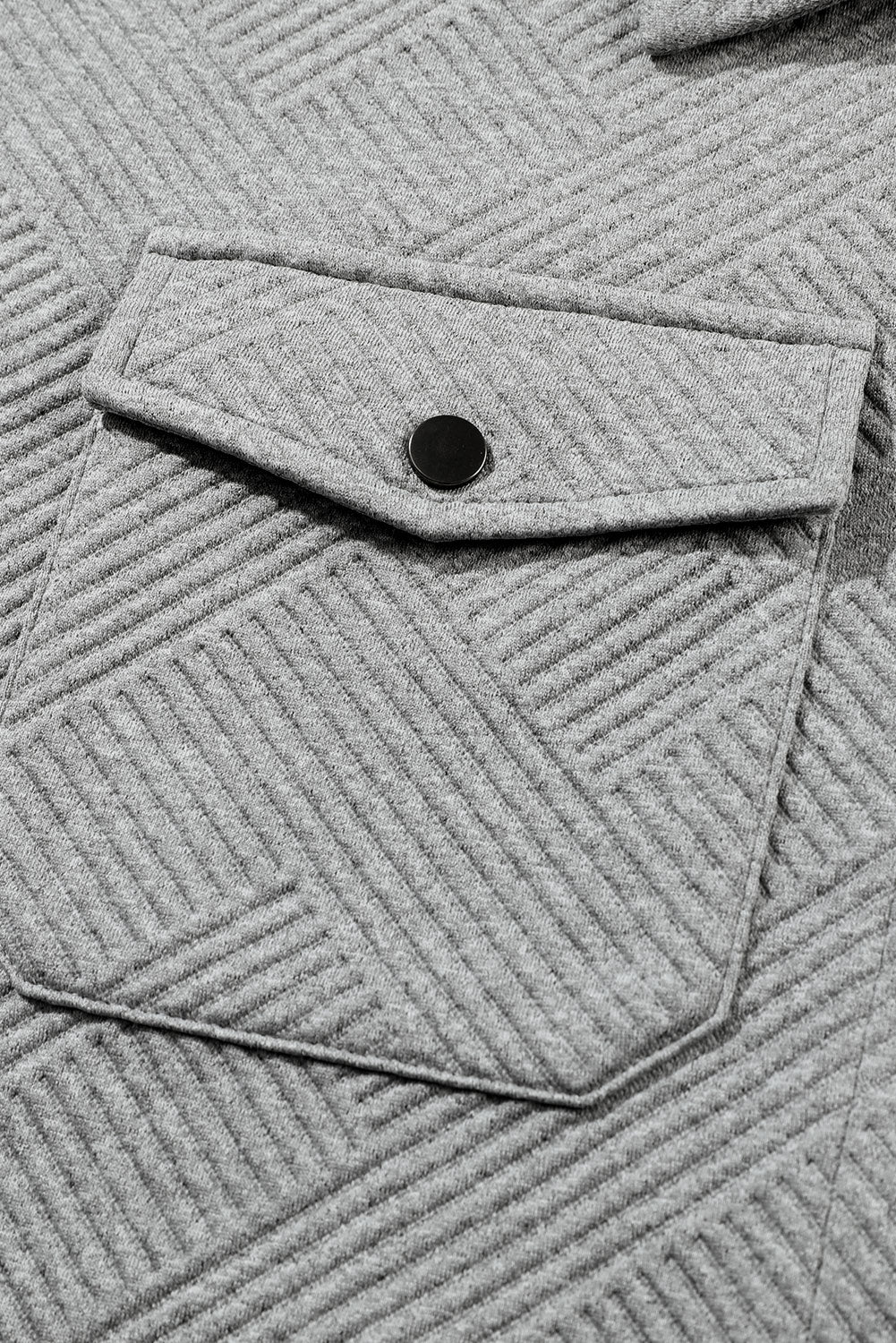 Veste boutonnée noire à poche à rabat texturé uni