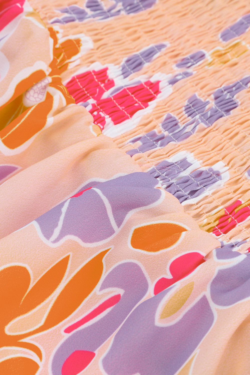 Camicetta peplo a maniche lunghe con stampa floreale rosa