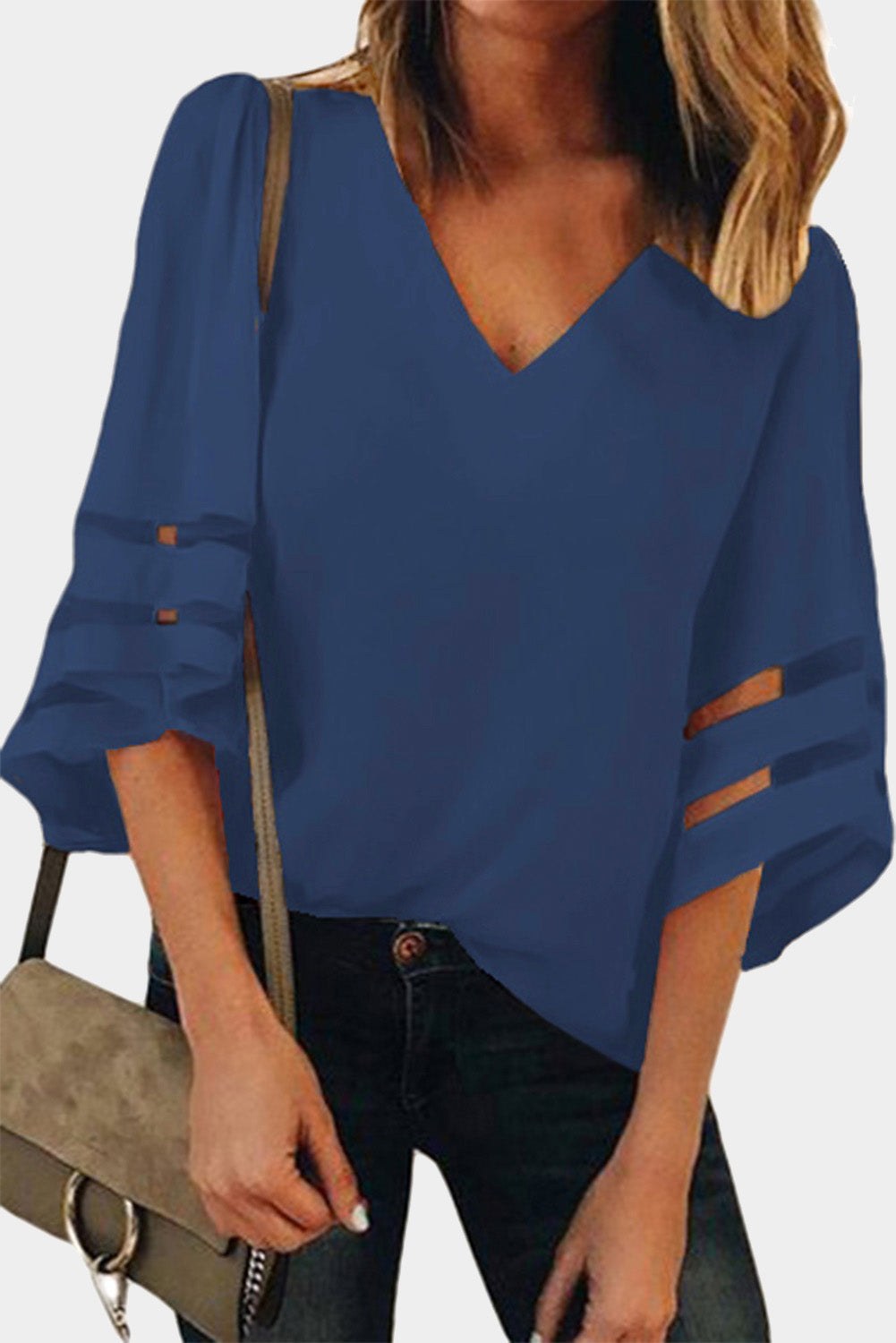 Blaue, lockere Bluse mit ausgestellten Ärmeln und V-Ausschnitt