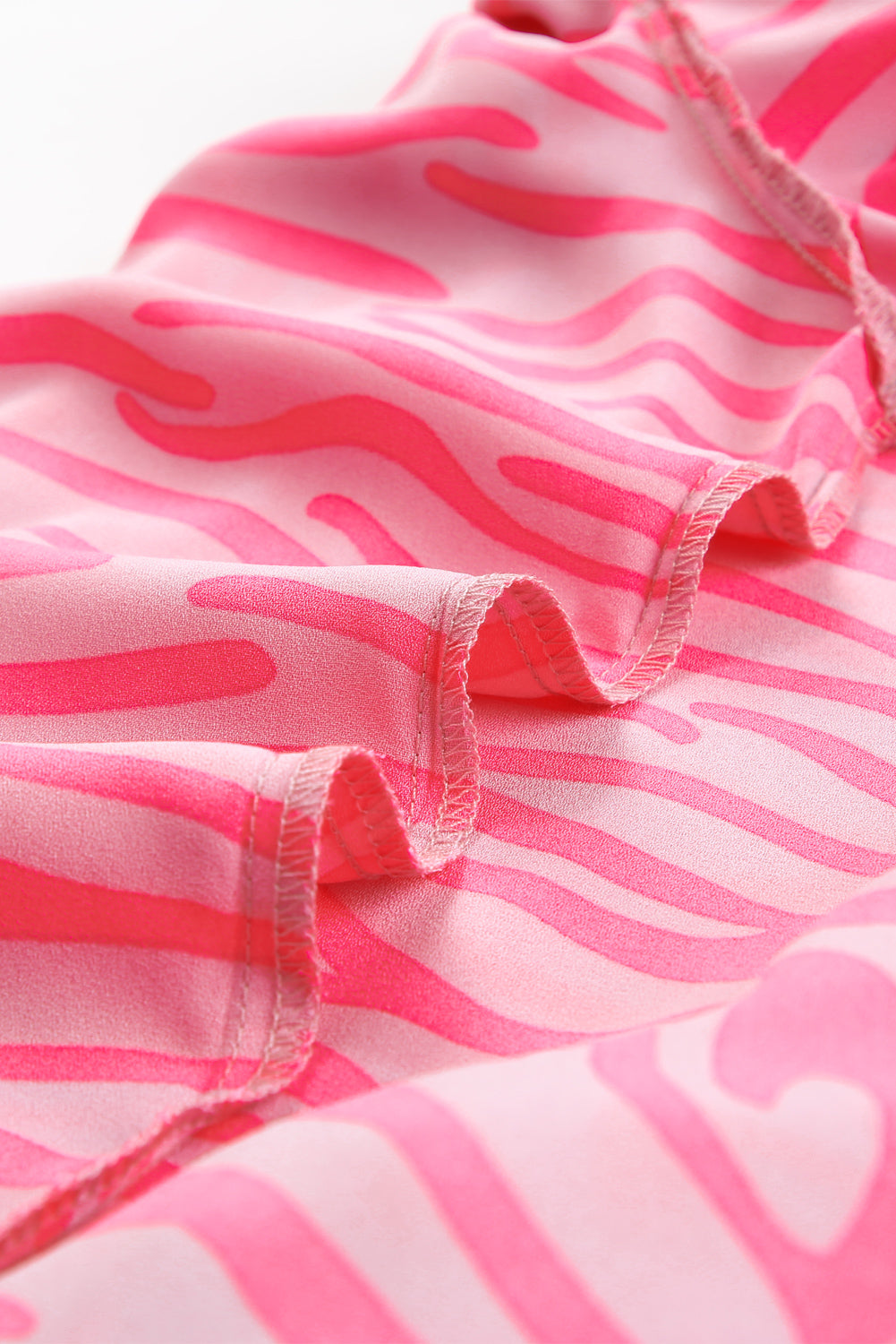 Rožnata majica z rokavi z zebrastim potiskom