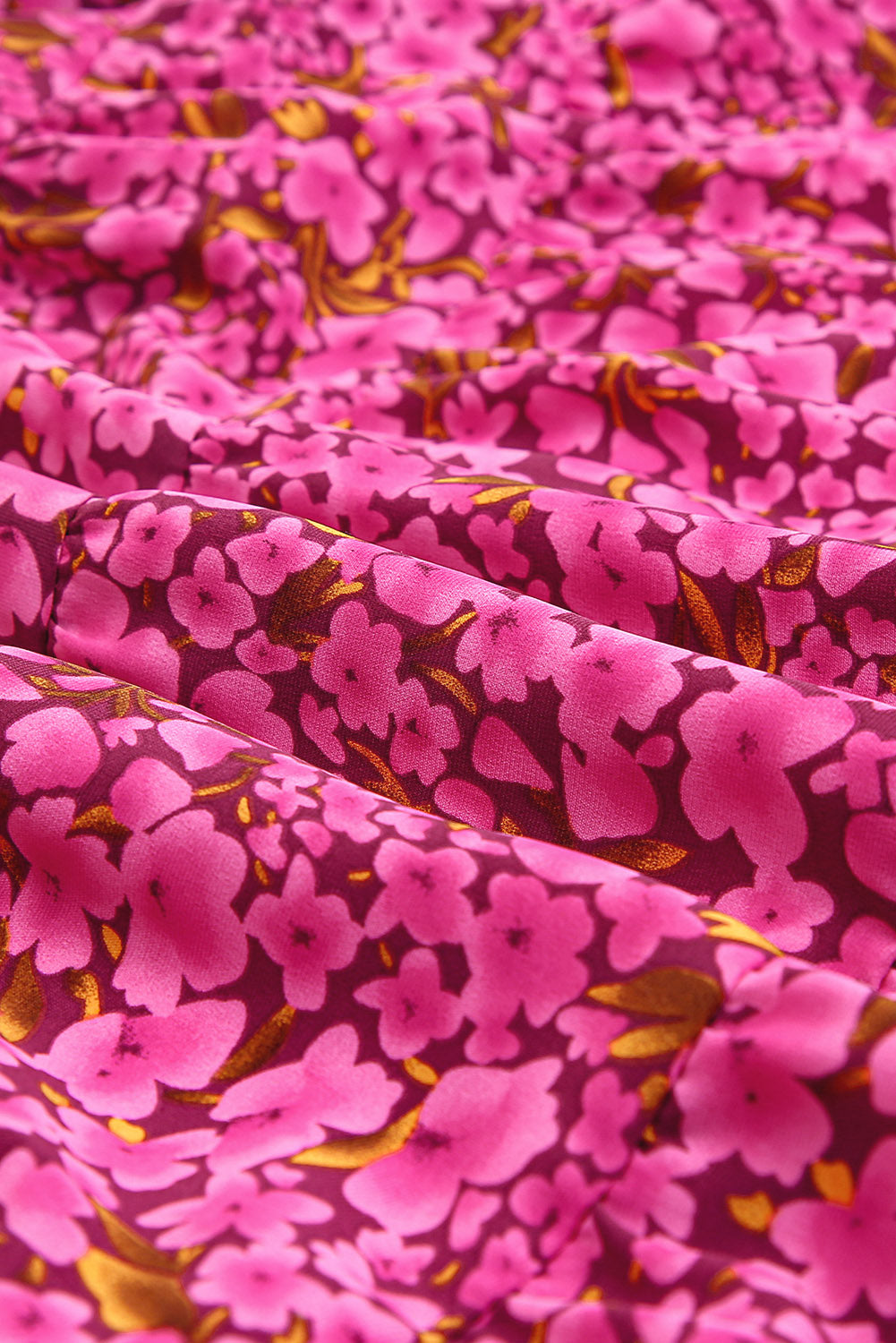 Rosafarbenes Babydoll-Minikleid mit Blumendruck und Puffärmeln