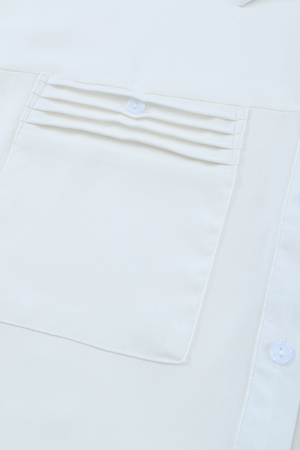Camicia abbottonata a maniche lunghe con tasca bianca in tinta unita