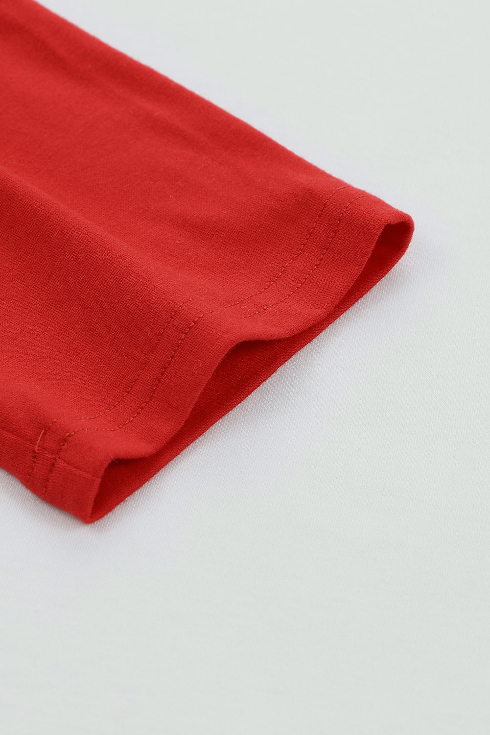 Top pullover con maniche raglan color block rosso fuoco