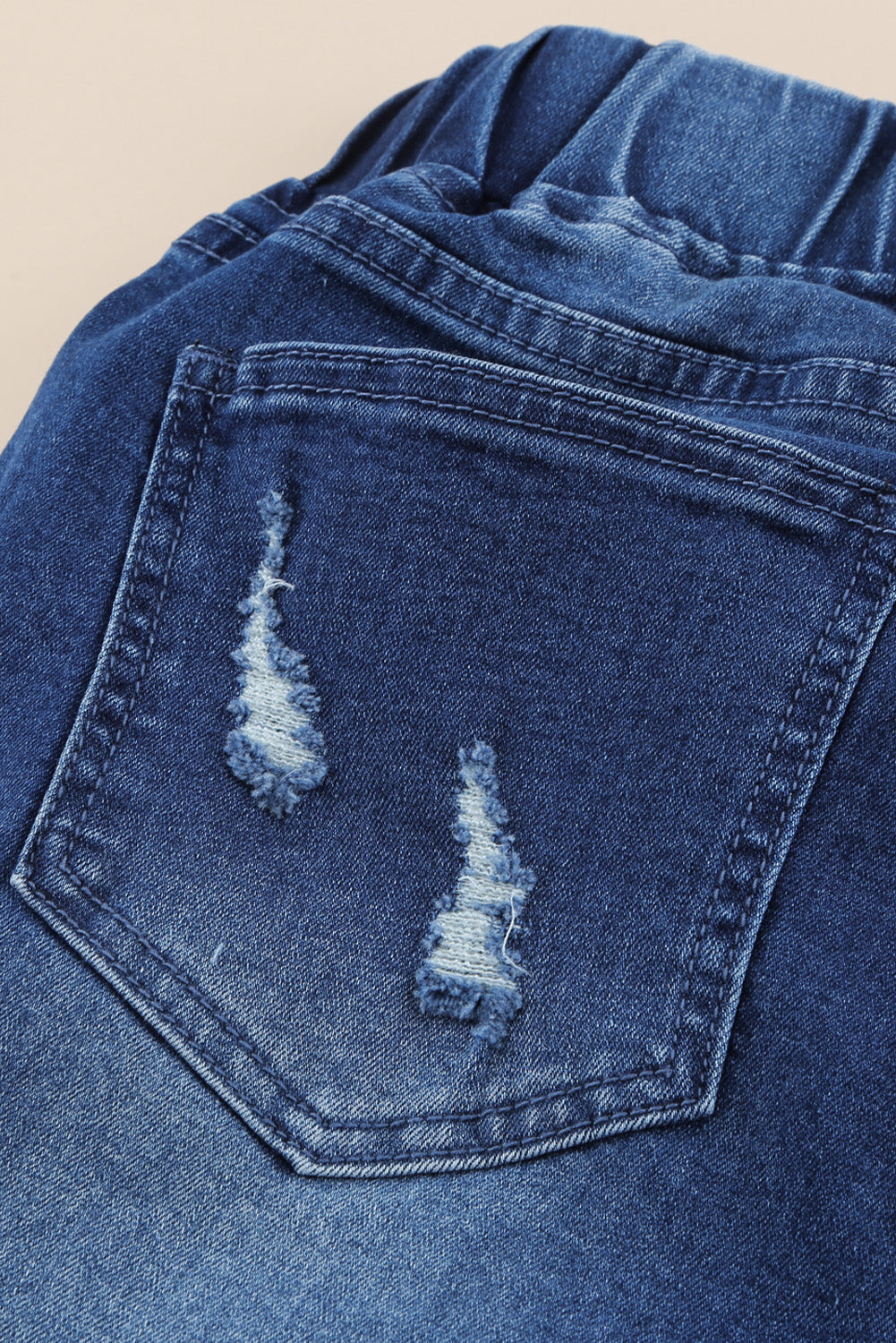 Jeans strappati con foro in vita elastico con coulisse blu