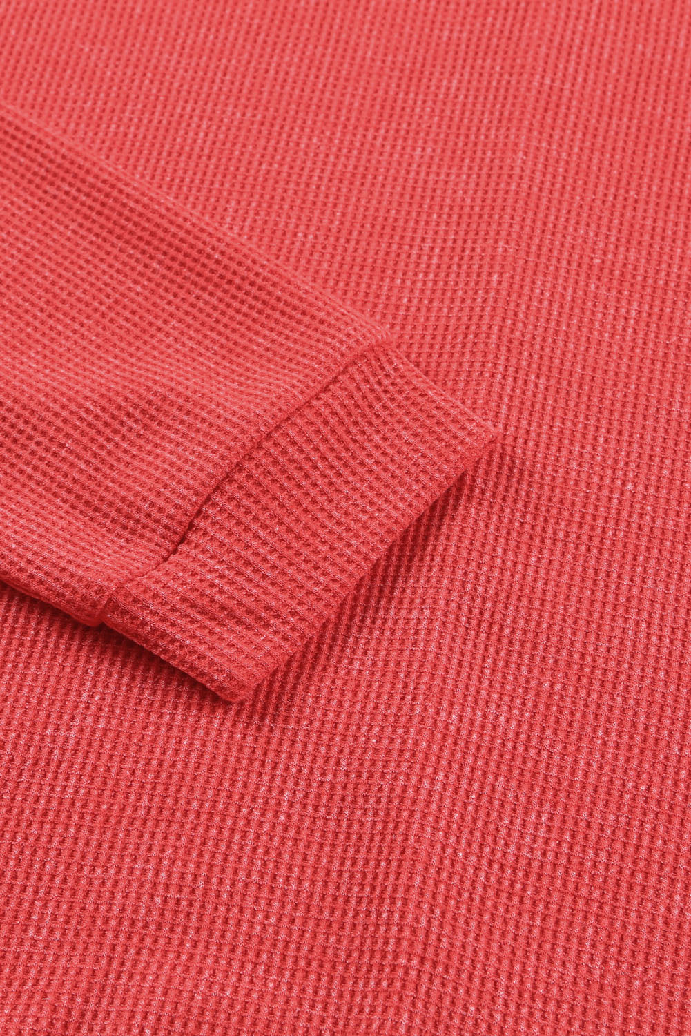 Haut pull gris en tricot gaufré avec fente latérale