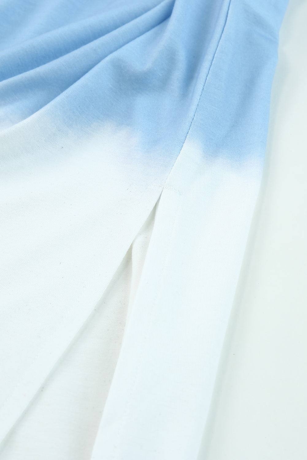 Robe longue fendue bleu ciel à bretelles spaghetti et teinture par nouage
