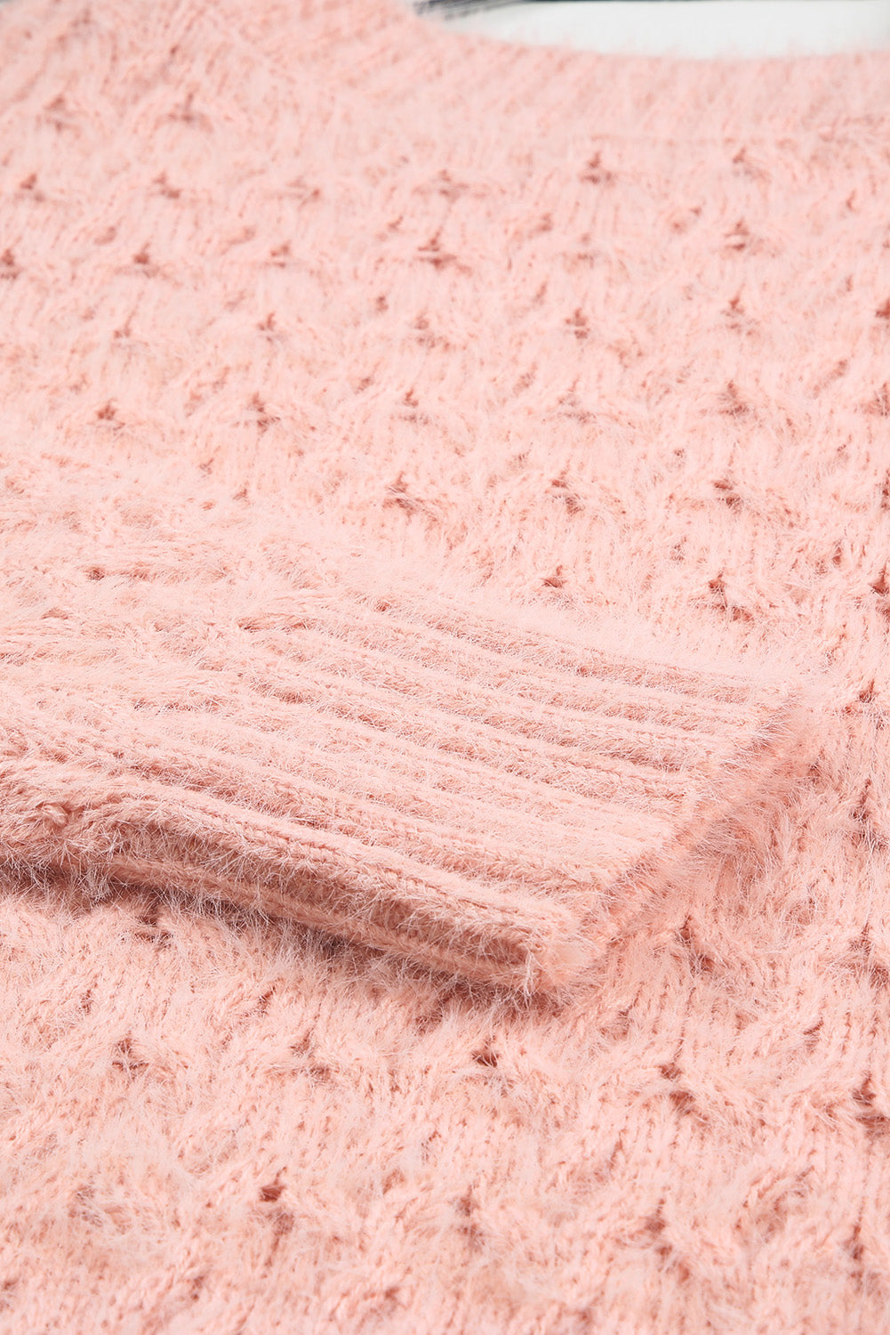 Džemper s trepavicama s asimetričnim izrezom u boji marelice