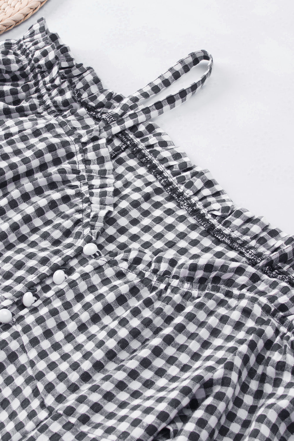 Schwarze, schulterfreie Bluse mit herzförmigem Gingham-Knöpfenmuster