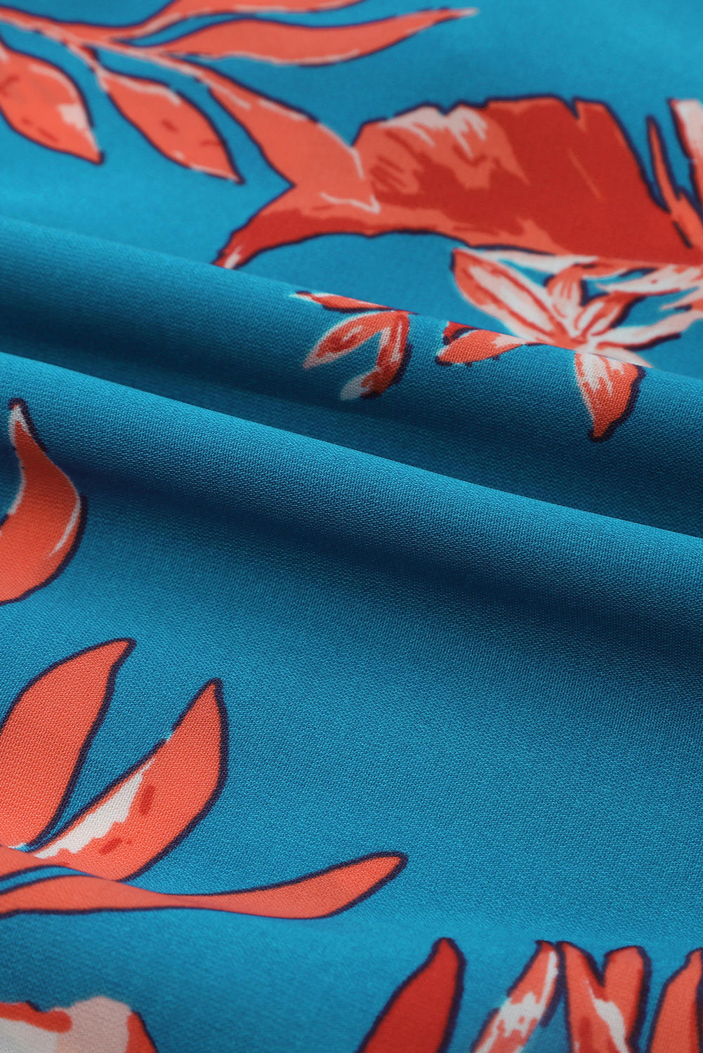 Nebesno modra mini obleka z naborki brez rokavov s cvetličnim vzorcem
