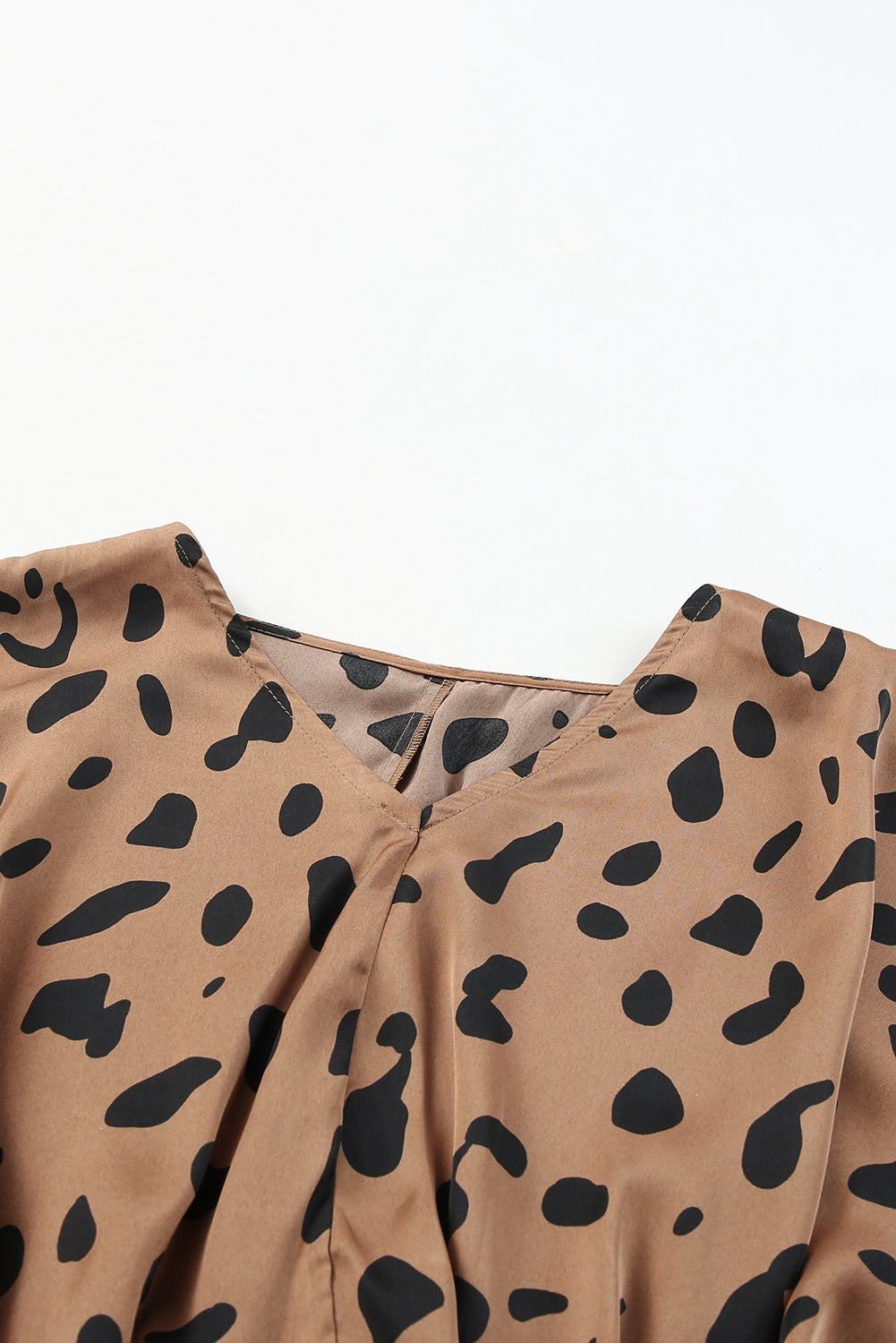 Peplum bluza z leopardjim potiskom z V izrezom