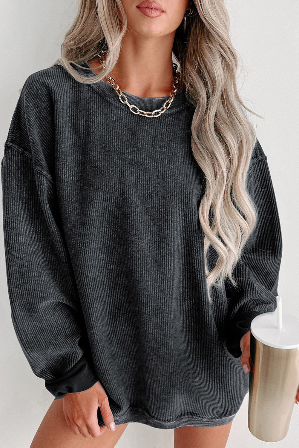 Schwarzes, einfarbiges Pullover-Sweatshirt aus Rippstrick mit Rundhalsausschnitt