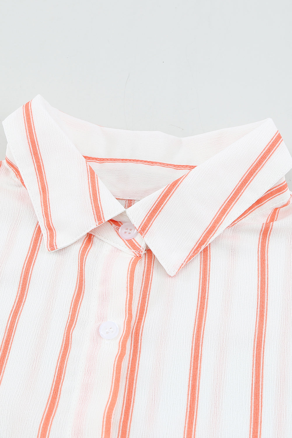 Camicia a righe con tasche arancioni