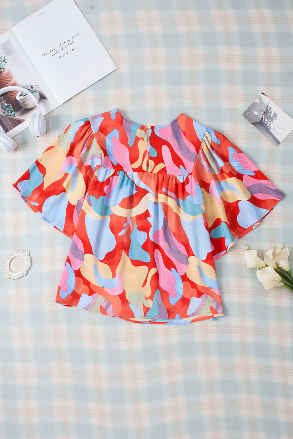 Mehrfarbige Bluse mit abstraktem Muster und weiten Ärmeln und Rundhalsausschnitt