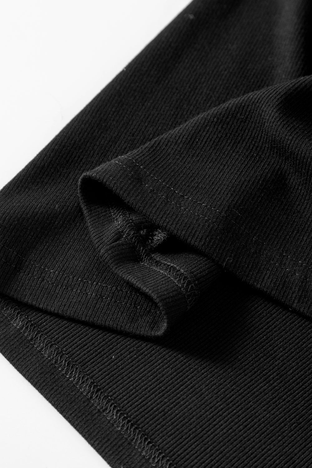 Schwarzes, halbärmliges Oberteil mit Stern-Pailletten-Spleißen