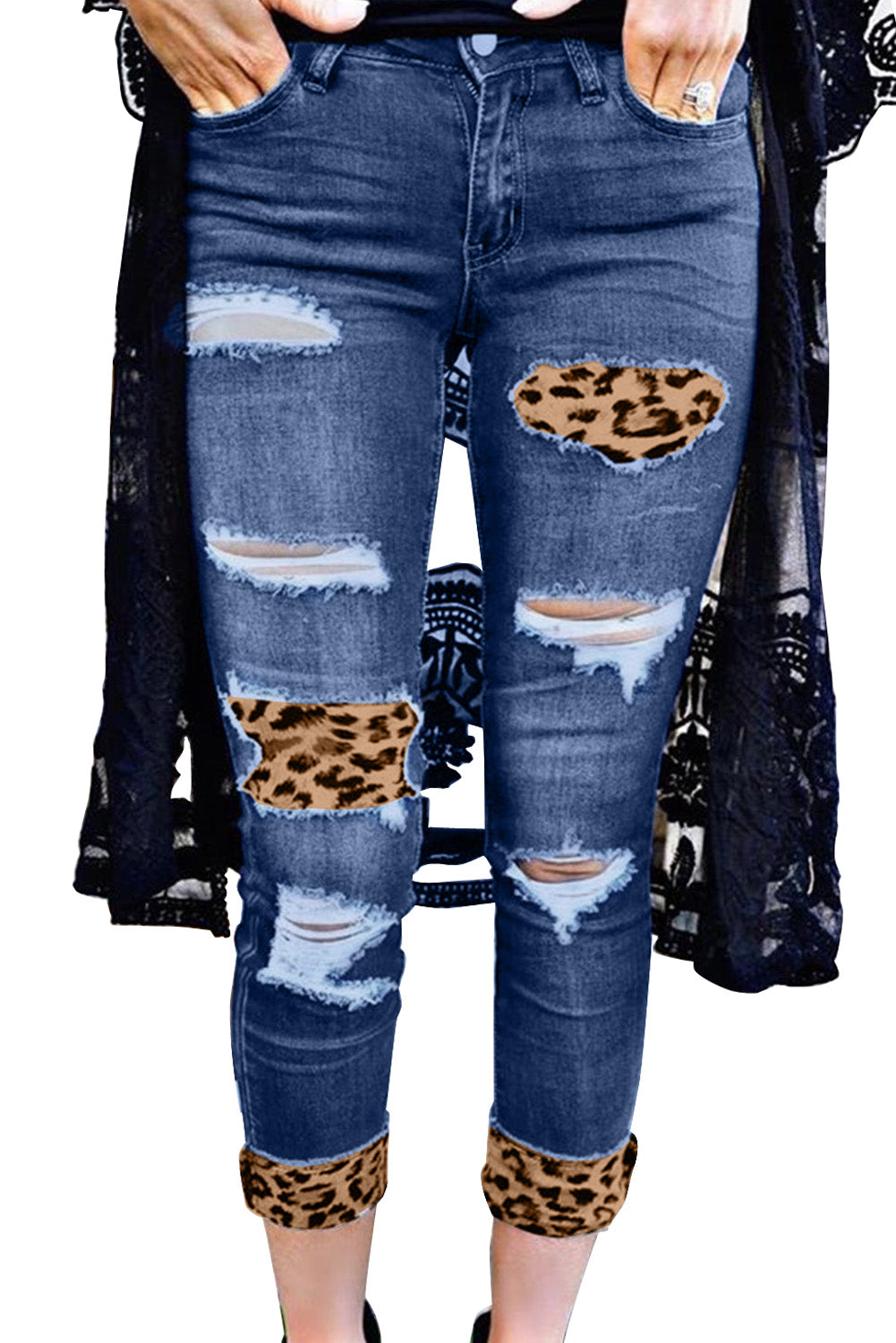 Jean skinny bleu effet vieilli à patchs léopard