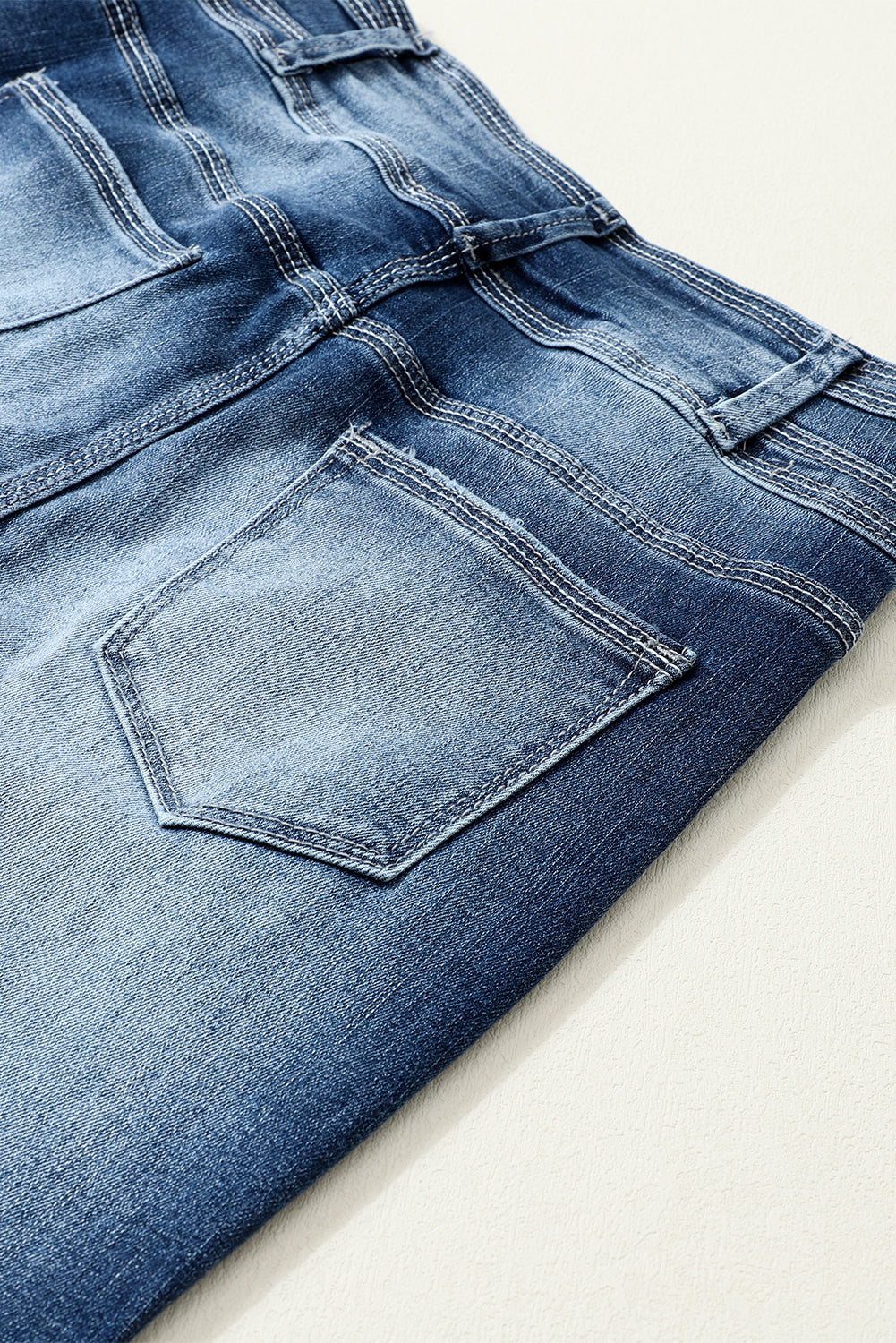 Jeans skinny a vita alta a due bottoni blu lavati vintage
