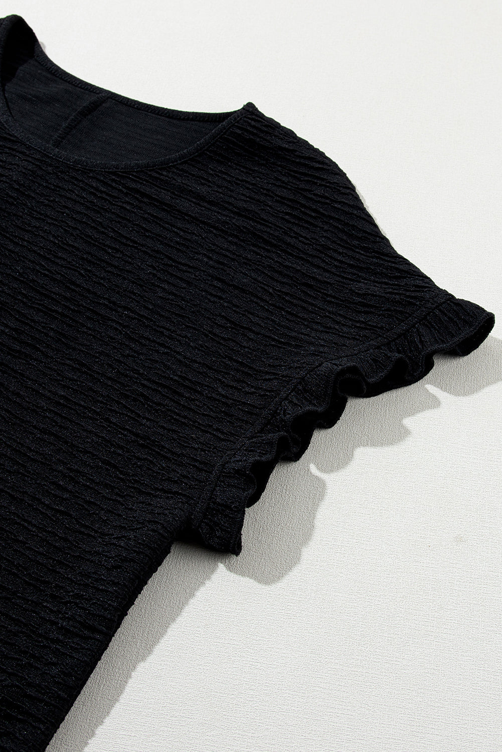 Jednobojna teksturirana bluza kratkih rukava s volanima boje marelice