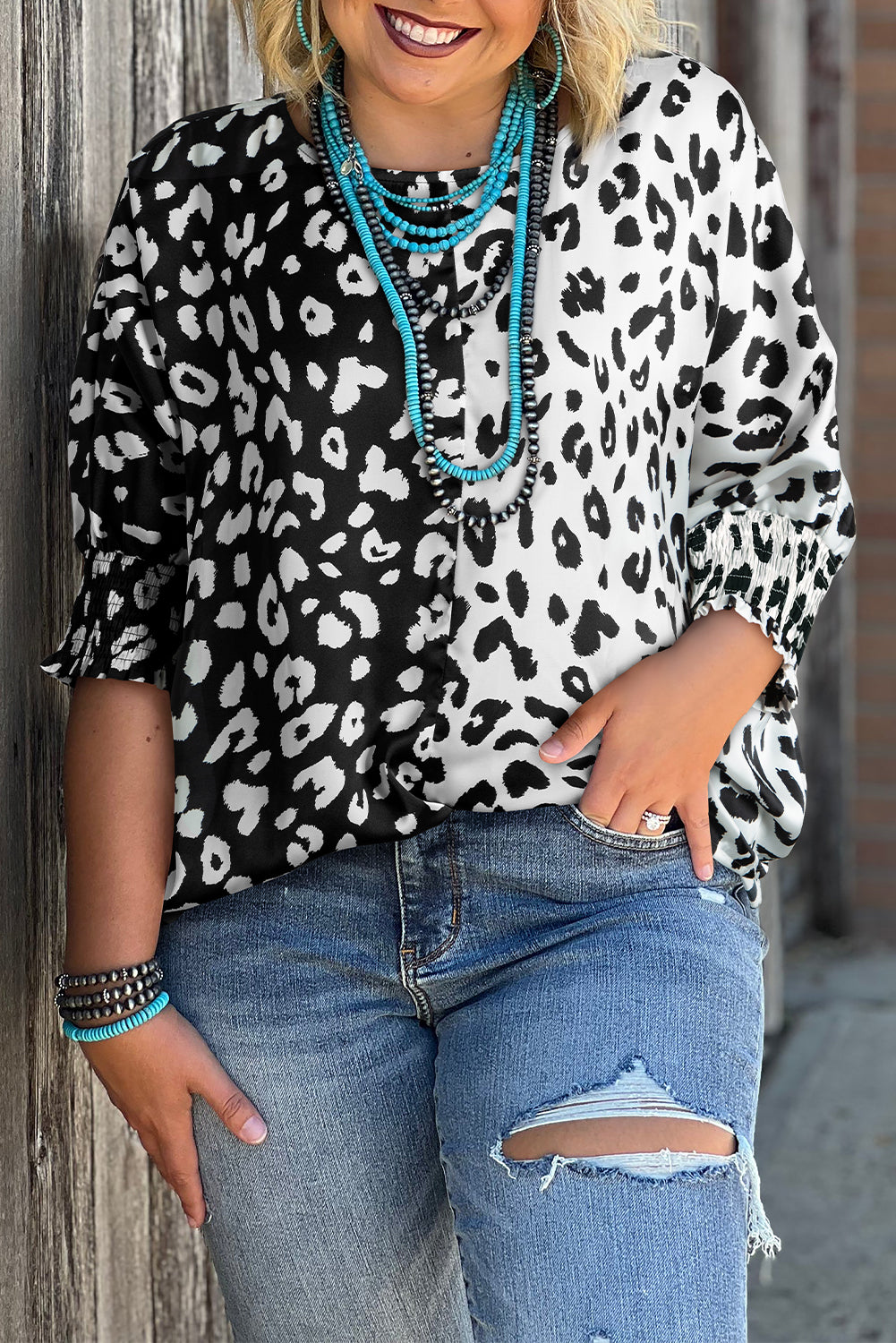 Schwarze Plus-Size-Bluse mit kontrastierenden Leopardenmuster und halben Ärmeln