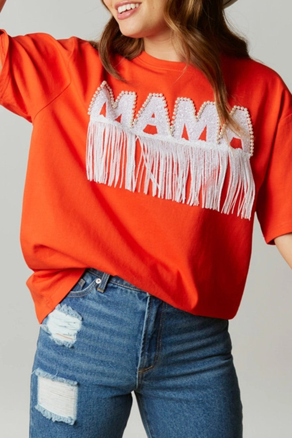 Orangefarbenes Oversize-T-Shirt mit Fransenbesatz und perlenbesetztem MAMA-Schriftzug