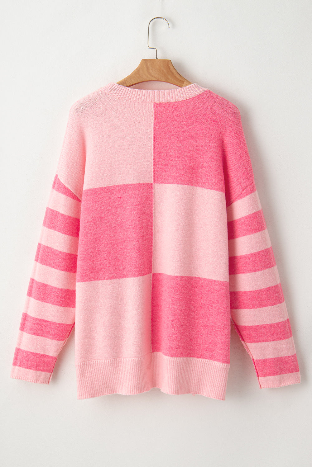 Maglione sciolto alto basso a righe color block a quadretti rosa