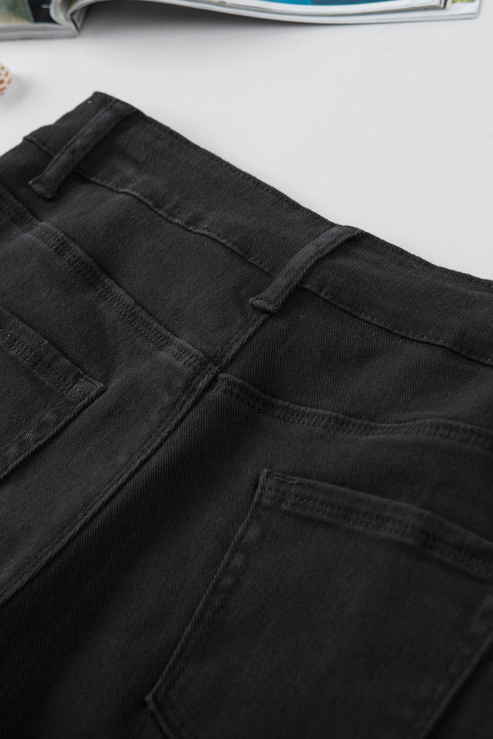 Pantaloncini di jeans invecchiati tinta unita neri