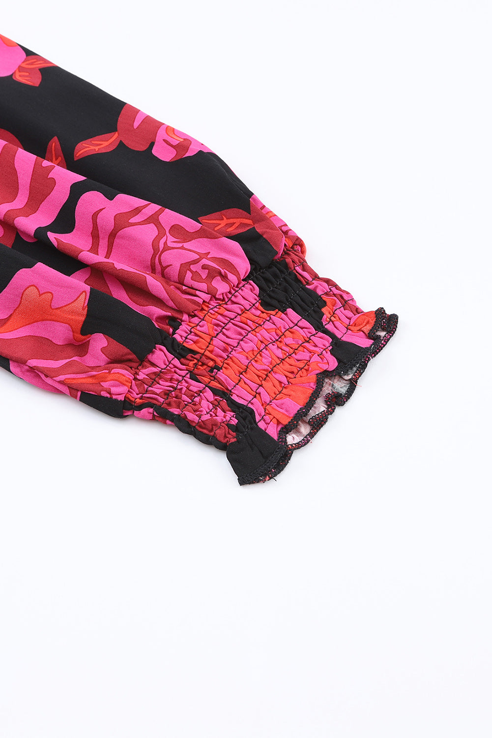 Chemise à manches longues et poignets froncés à fleurs roses