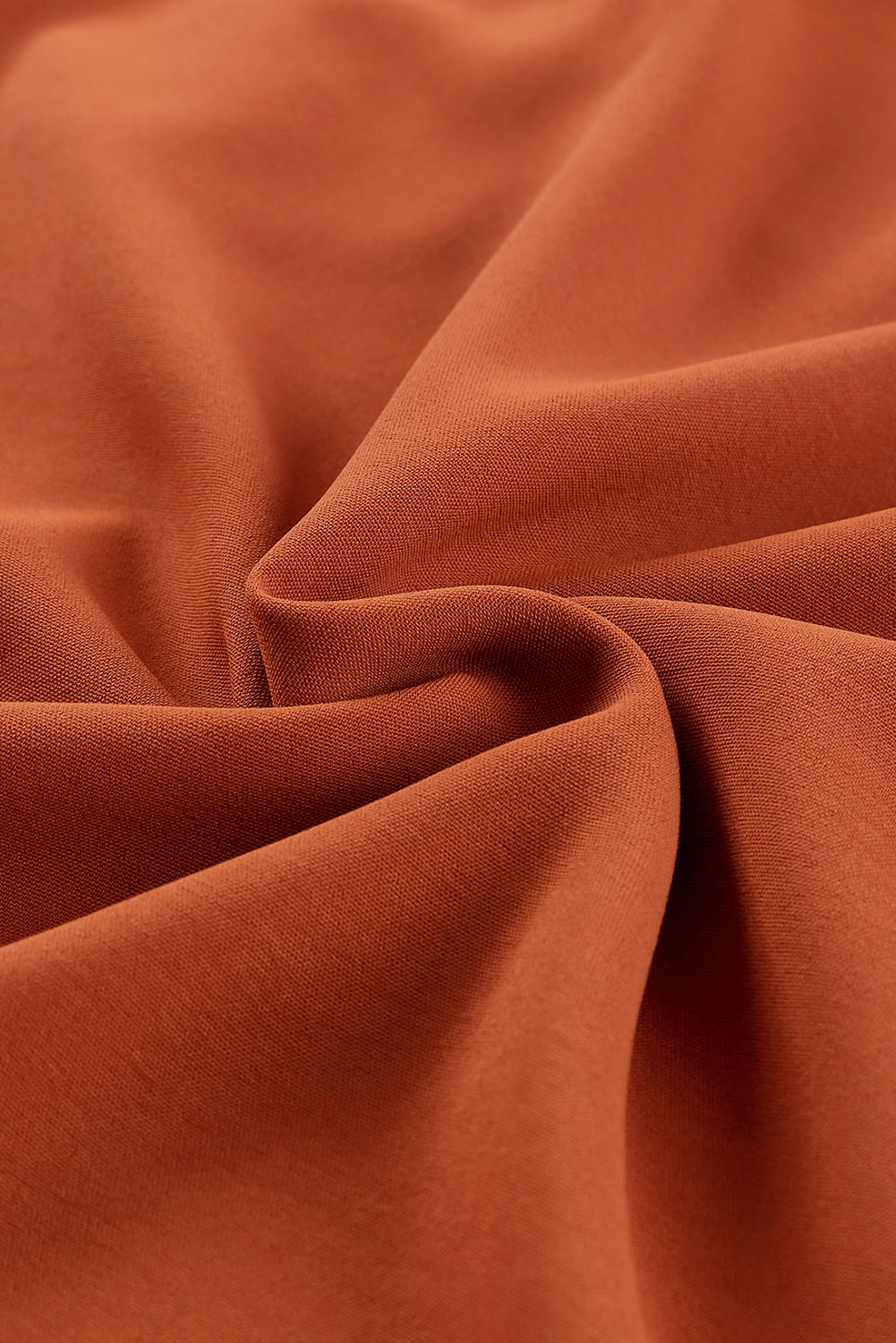 Orangefarbene, geknöpfte, plissierte Bluse mit V-Ausschnitt