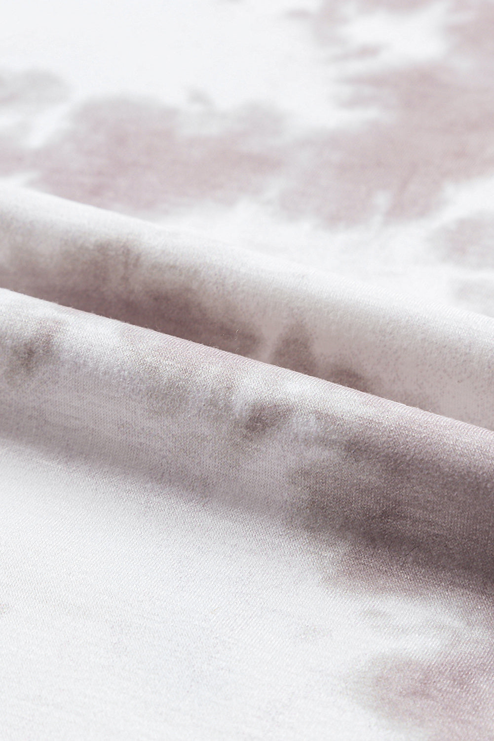 Top bianco a maniche corte con scollo rotondo e tintura in tie-dye