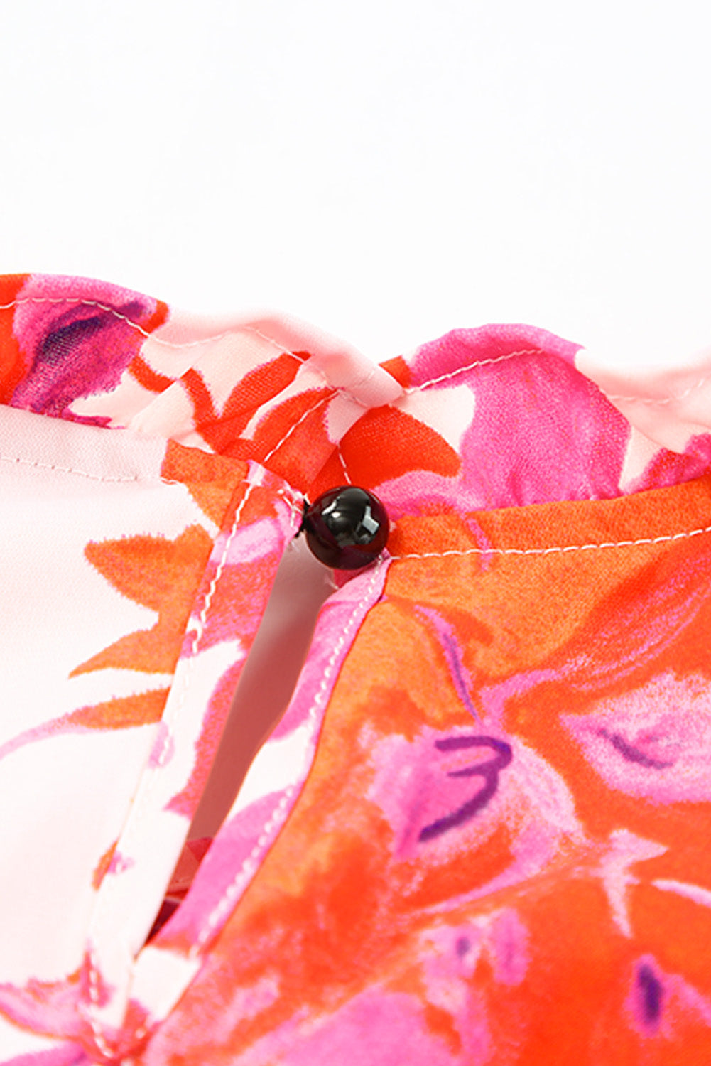 Camicetta floreale taglie forti con volant rosa e maniche a balze