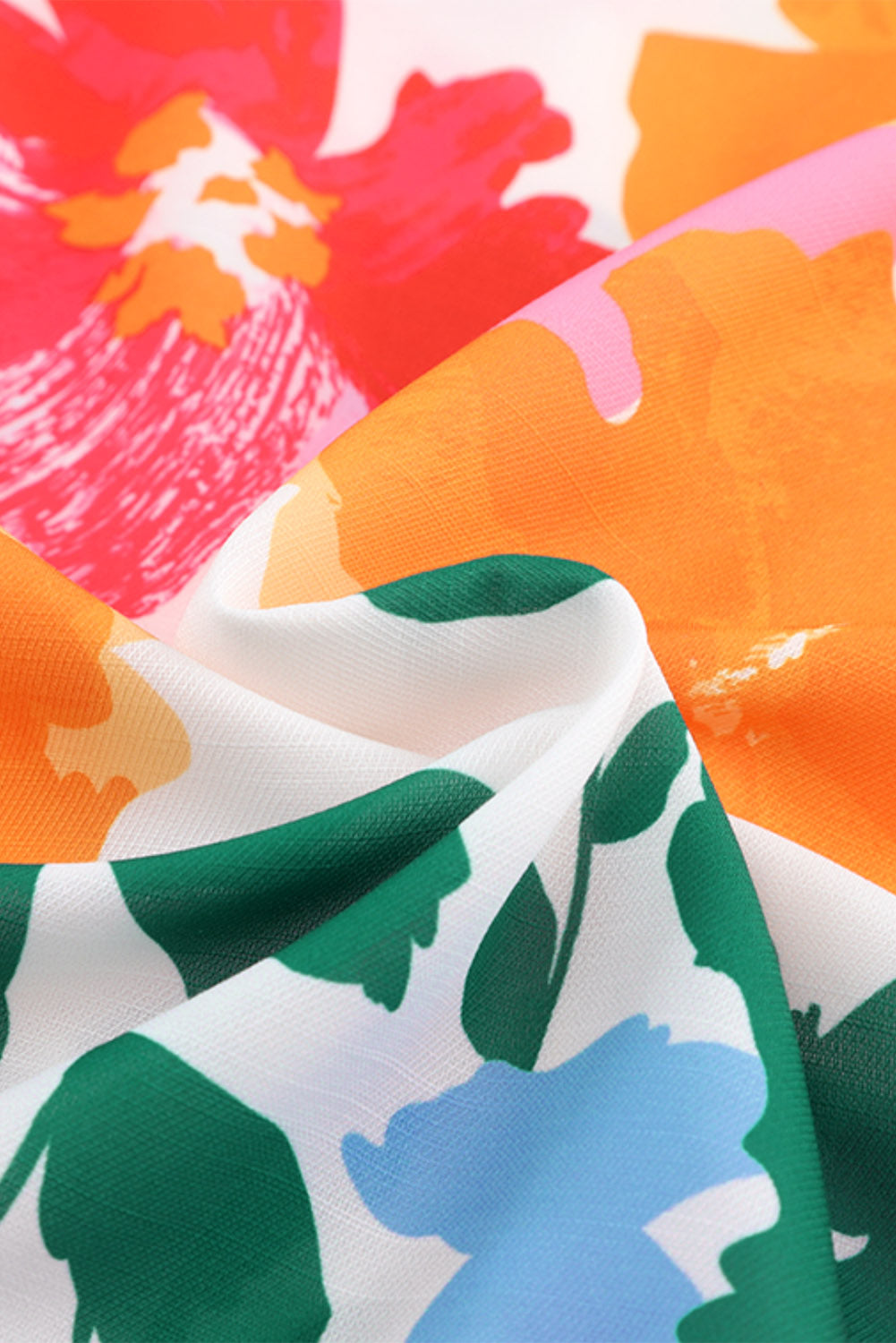 Chemise multicolore à manches bouffantes et bordure à volants à imprimé floral