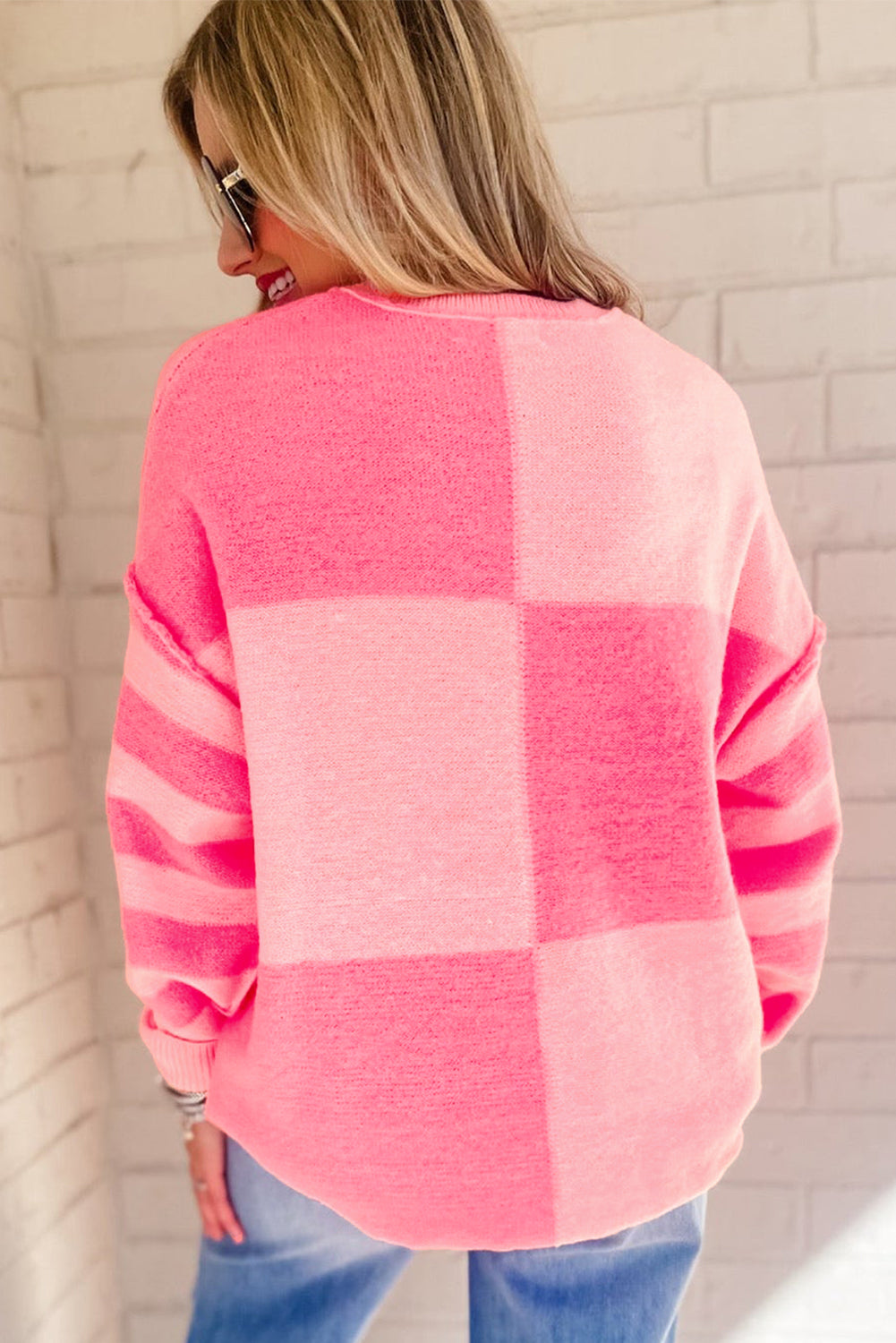 Maglione sciolto alto basso a righe color block a quadretti rosa