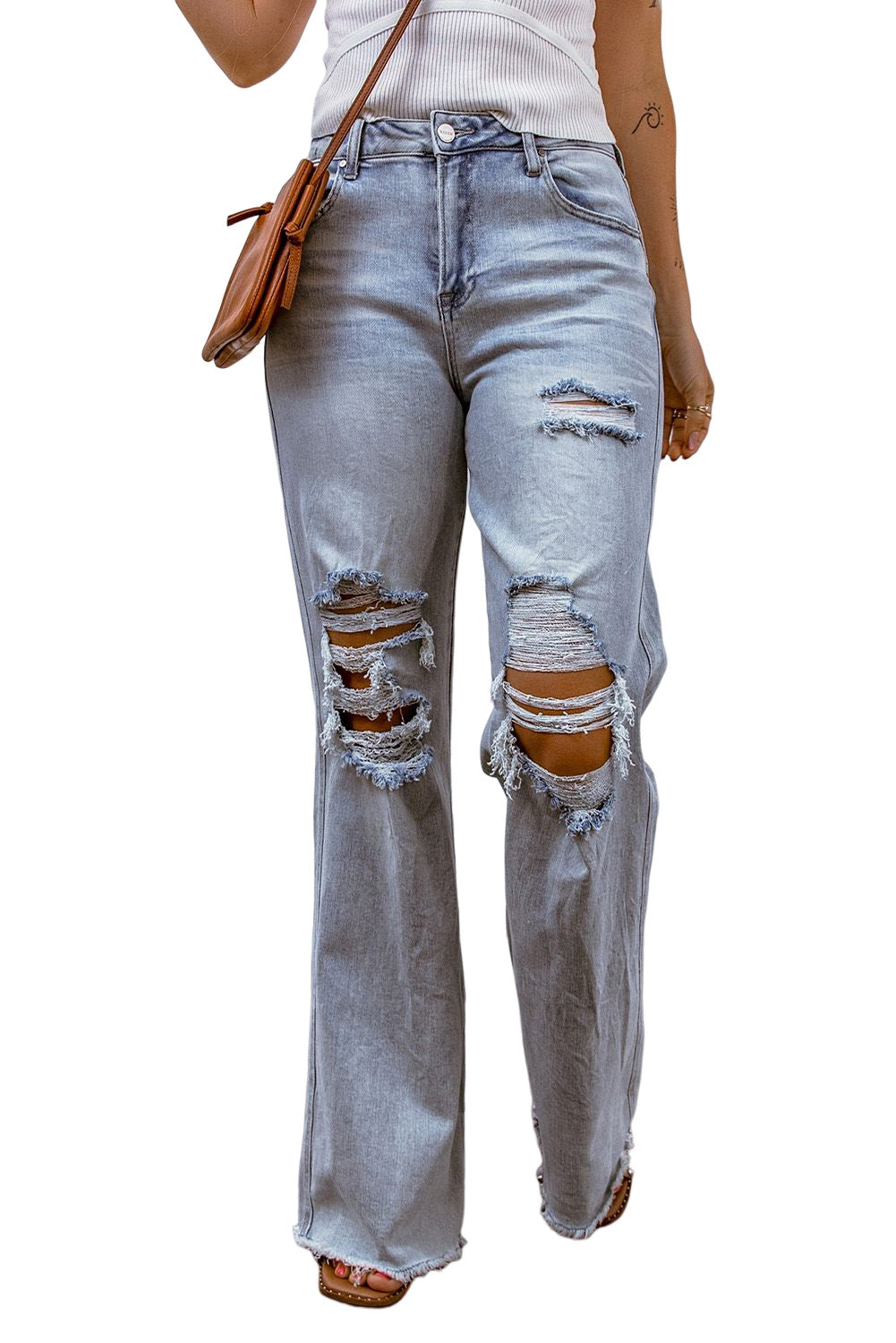 Jeans effetto consumato con gamba larga e orlo grezzo, lavaggio acido azzurro cielo