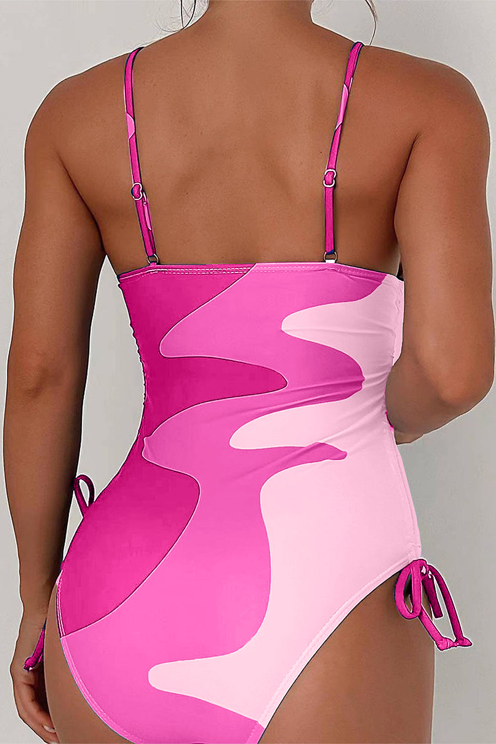 Jednodijelni kupaći kostim s otisnutim bojama s uzicom na bočnim stranama