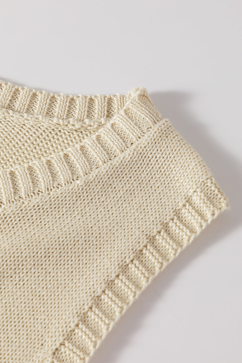 Gilet pull en tricot de couleur unie beige avec détail pointelle