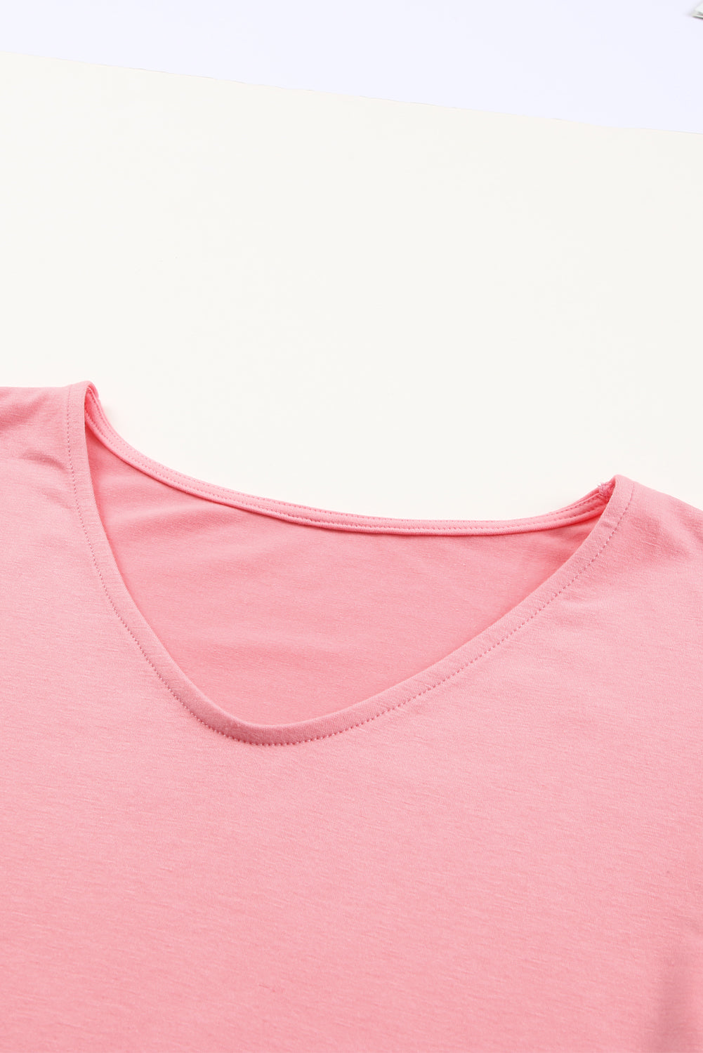 Ružičasta majica s mjehurastim rukavima u blok boji