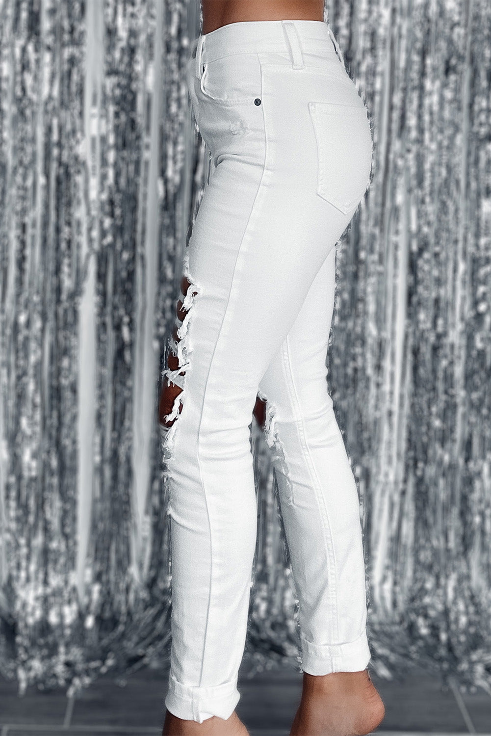 Weiße Skinny-Jeans mit hoher Taille und zerrissenen Löchern im Distressed-Look