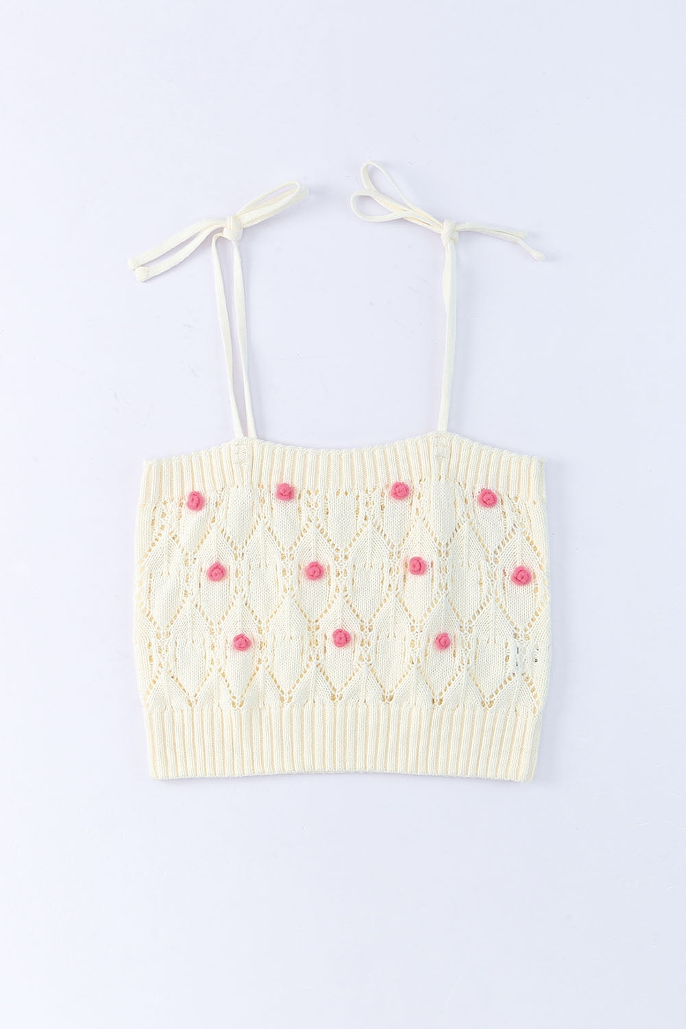 Top court beige à bretelles spaghetti et appliques roses en tricot au crochet