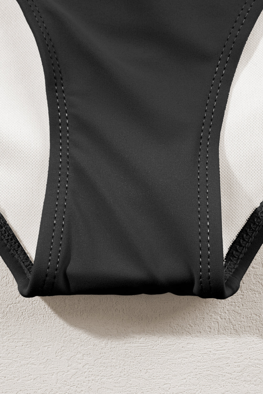 Črne črtaste bikini kopalke z visokim pasom v patchwork traku