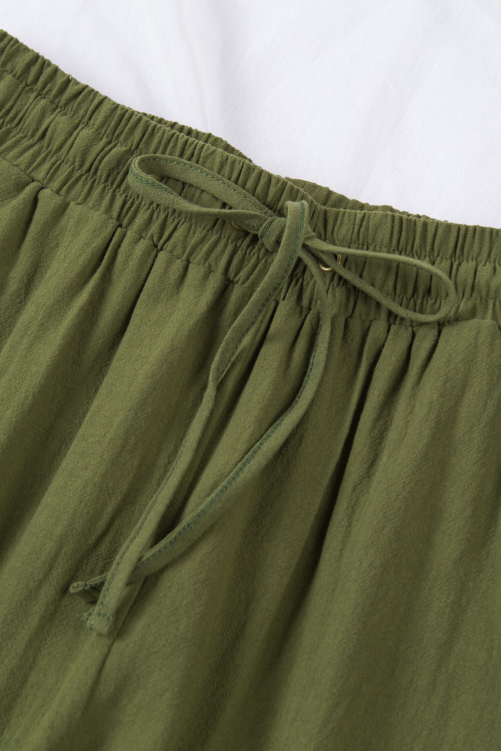 Zelene duge hlače s elastičnim džepovima u struku i ravnim nogavicama
