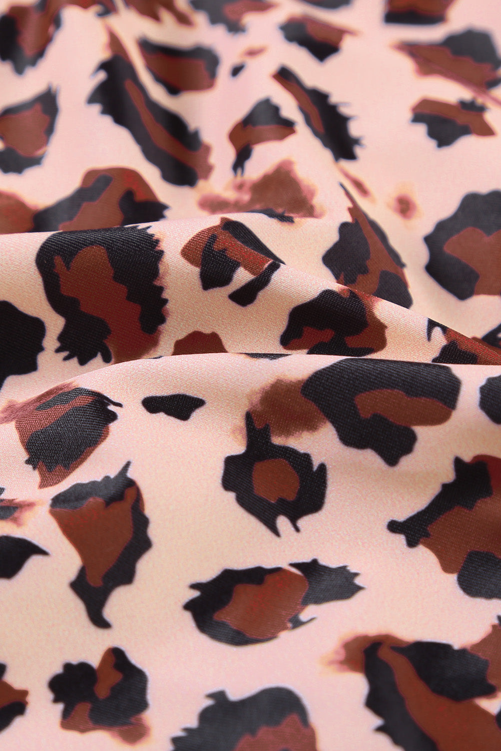 Einteiliger Badeanzug mit tiefem V-Ausschnitt und Colorblock-Leoparden-Unterteil