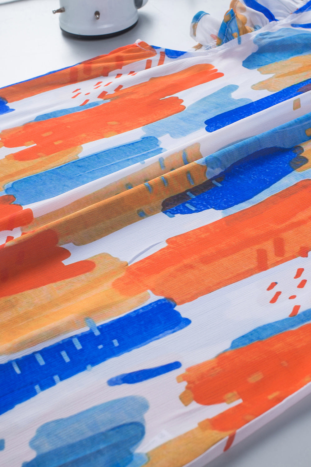 Canotta con maniche svolazzanti stampate multicolor con volant