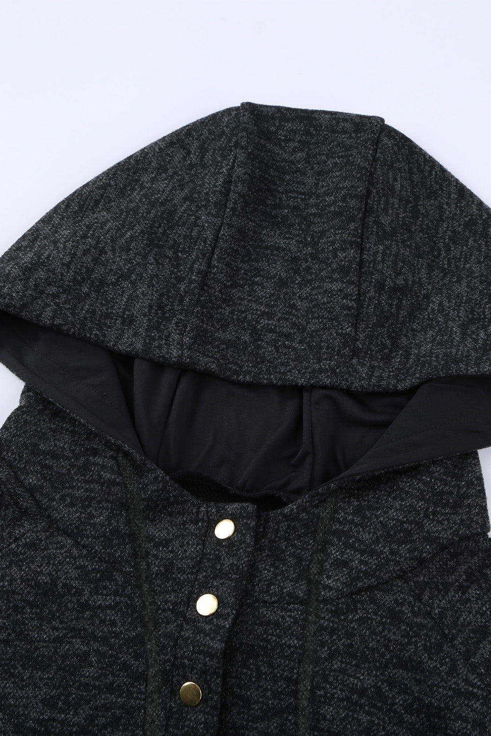 Črn pulover s kapuco in gumbi s potiskom