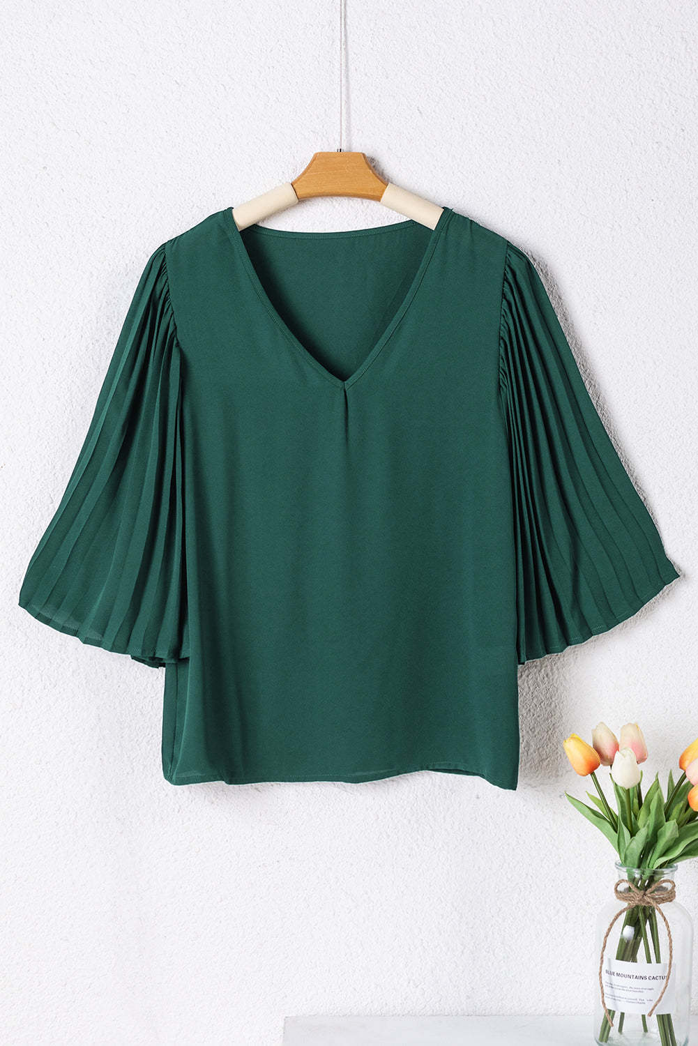 Črno zelena 3/4 bluza z zvončastimi rokavi in ​​v-izrezom