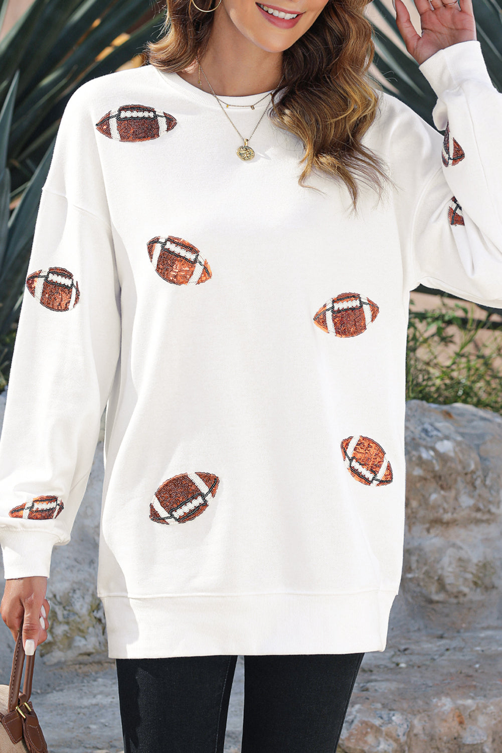 Weißes Pullover-Sweatshirt mit Rugby-Grafik und Pailletten