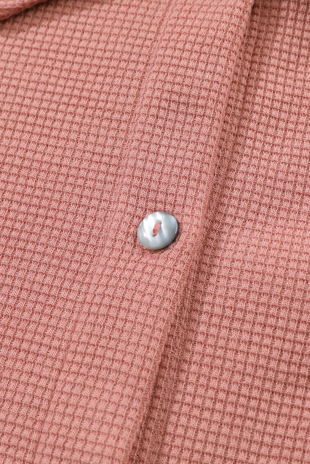 Maglione in maglia waffle con tasca rosa con volant