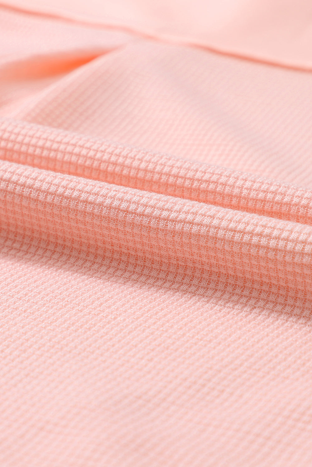 Rosafarbenes Waffelstrick-Kurzarmhemd mit Acid-Waschung und Knöpfen